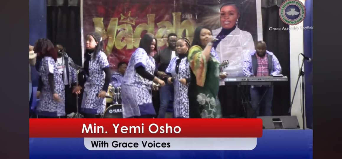 Ministering on stage during an event in the UK